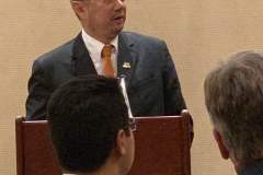 At the podium
